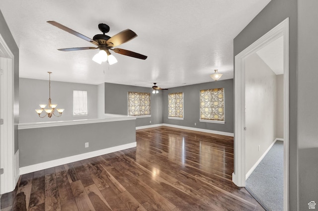 797 E 10 S, American Fork, UT 84003 - unfurnished room featuring dark wood-type flooring, a ceiling fan, and a chandelier