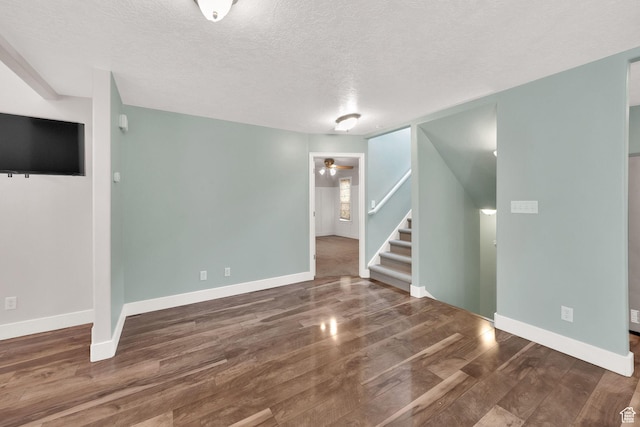 797 E 10 S, American Fork, UT 84003 - empty room with stairs, a textured ceiling, wood finished floors, and ceiling fan