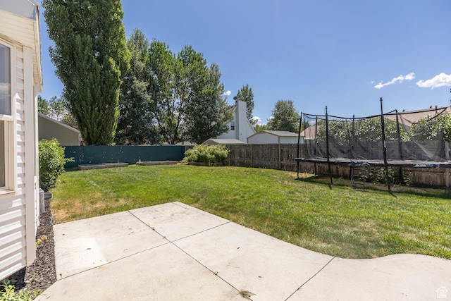 1104 E 220 N, Heber City, UT 84032 - fenced backyard featuring a trampoline and a patio