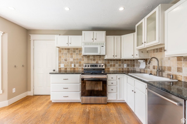 1104 E 220 N, Heber City, UT 84032 - kitchen featuring stainless steel appliances, tasteful backsplash, white cabinetry, and recessed lighting