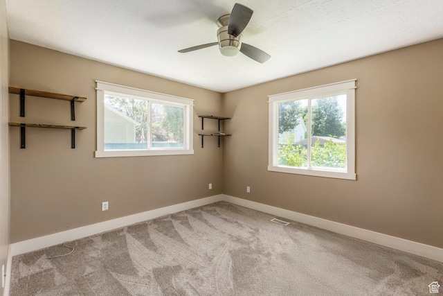 1104 E 220 N, Heber City, UT 84032 - carpeted empty room featuring healthy amount of natural light and a ceiling fan