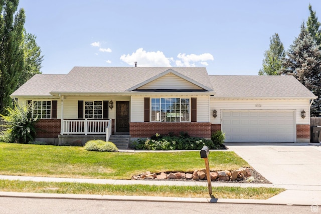1104 E 220 N, Heber City, UT 84032 - ranch-style home featuring a porch, a garage, brick siding, and concrete driveway