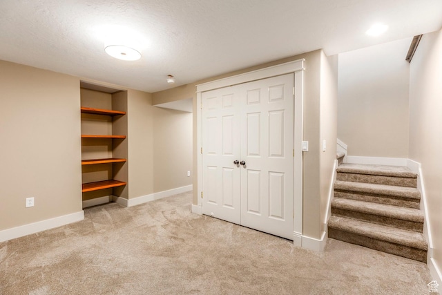 1104 E 220 N, Heber City, UT 84032 - finished below grade area with carpet flooring, stairway, and a textured ceiling