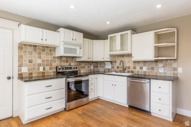 1104 E 220 N, Heber City, UT 84032 - kitchen featuring stainless steel appliances, white cabinetry, light wood-style flooring, and recessed lighting