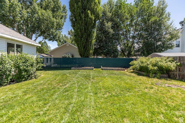 1104 E 220 N, Heber City, UT 84032 - fenced backyard featuring a vegetable garden