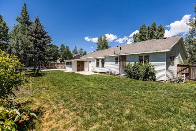 1104 E 220 N, Heber City, UT 84032 - rear view of property with a trampoline and a patio