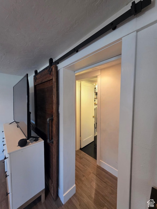1525 N 1250 W, Provo, UT 84604 - hall featuring wood finished floors, a barn door, and a textured ceiling