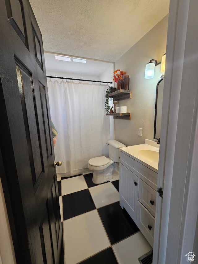1525 N 1250 W, Provo, UT 84604 - bathroom featuring tile patterned floors, a textured ceiling, vanity, and a shower with shower curtain