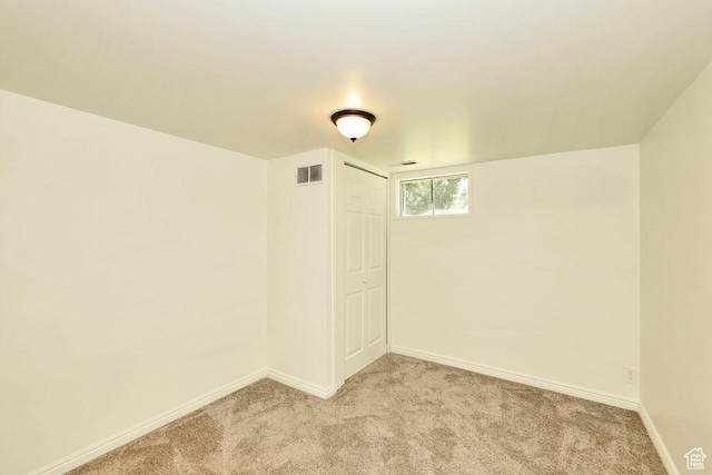 3165 S Jackson Ave, Ogden, UT 84403 - unfurnished room with light colored carpet and baseboards