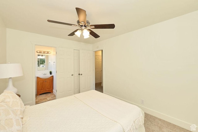 3165 S Jackson Ave, Ogden, UT 84403 - bedroom with carpet flooring, ensuite bath, ceiling fan, and a closet