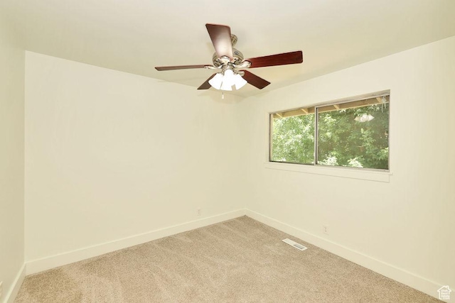 3165 S Jackson Ave, Ogden, UT 84403 - spare room with light carpet and a ceiling fan