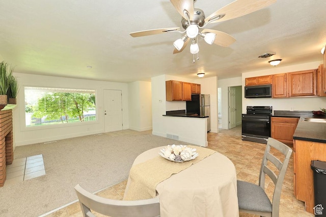 3165 S Jackson Ave, Ogden, UT 84403 - dining area with baseboards and a ceiling fan