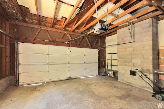 3165 S Jackson Ave, Ogden, UT 84403 - garage featuring a garage door opener