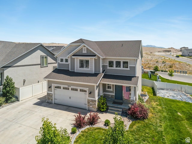 9634 N Red Bridge Rd, Eagle Mountain, UT 84005 - view of front of property with a garage, concrete driveway, stone siding, a porch, and roof with shingles
