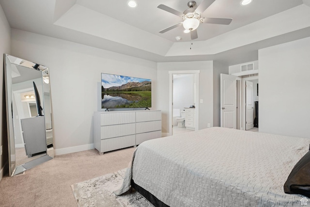 9634 N Red Bridge Rd, Eagle Mountain, UT 84005 - bedroom with light colored carpet, a raised ceiling, ensuite bath, recessed lighting, and ceiling fan