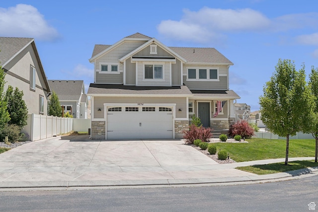 9634 N Red Bridge Rd, Eagle Mountain, UT 84005 - craftsman inspired home with a garage, concrete driveway, and stone siding