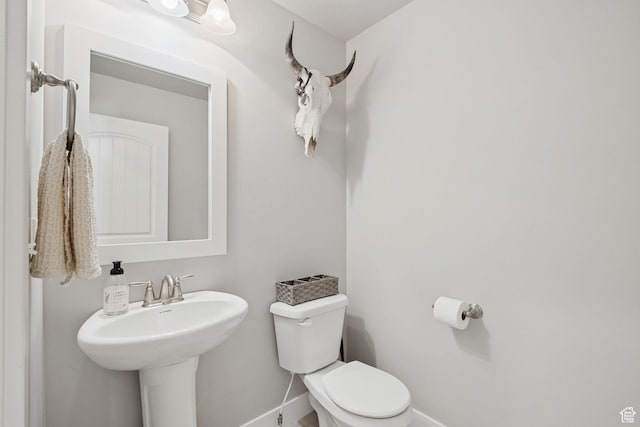 9634 N Red Bridge Rd, Eagle Mountain, UT 84005 - bathroom with toilet and baseboards