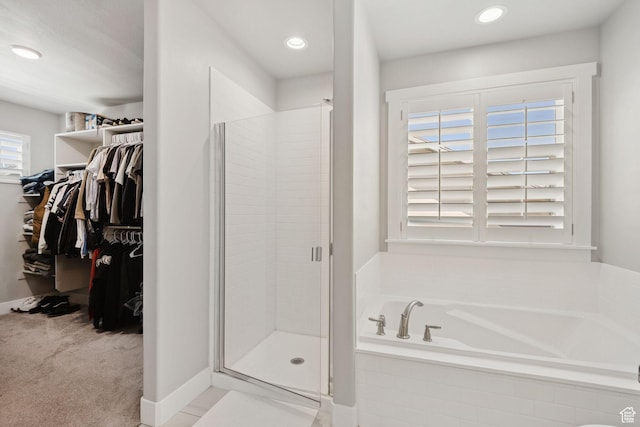 9634 N Red Bridge Rd, Eagle Mountain, UT 84005 - bathroom with a bath, a shower stall, a spacious closet, and recessed lighting