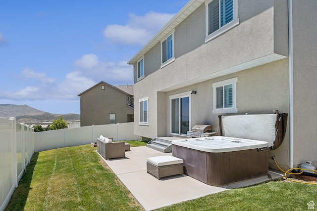 9634 N Red Bridge Rd, Eagle Mountain, UT 84005 - back of property featuring a fenced backyard, a patio, a mountain view, and stucco siding