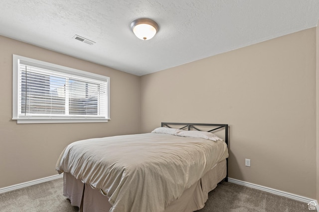 2256 W 1680 N, Clinton, UT 84015 - carpeted bedroom with baseboards and a textured ceiling