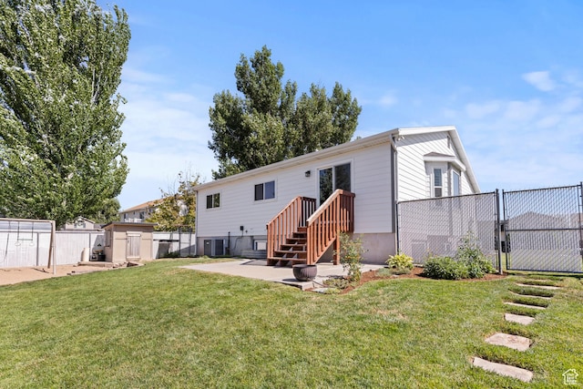 2256 W 1680 N, Clinton, UT 84015 - back of property with a shed and a patio