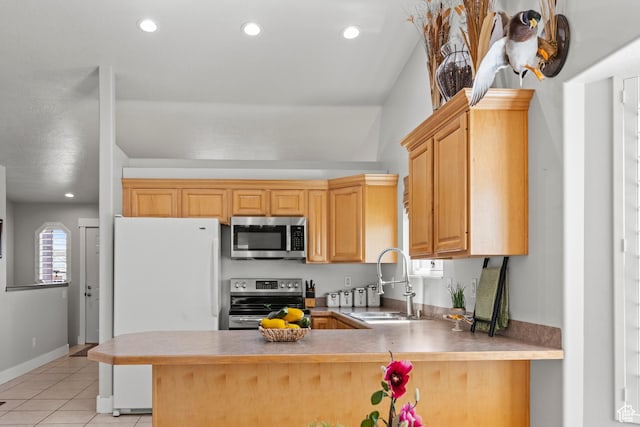 2256 W 1680 N, Clinton, UT 84015 - kitchen featuring stainless steel appliances, light tile patterned floors, recessed lighting, and a peninsula