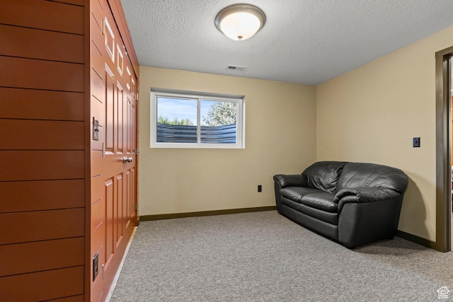 2256 W 1680 N, Clinton, UT 84015 - sitting room featuring a textured ceiling and carpet floors