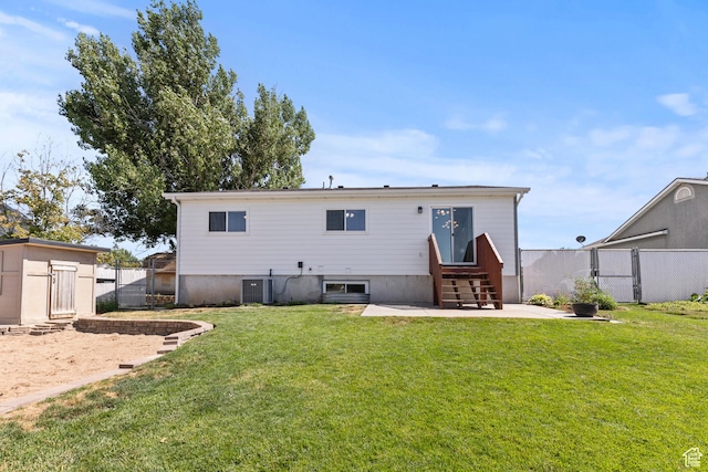 2256 W 1680 N, Clinton, UT 84015 - back of house featuring entry steps, a patio area, and an outdoor structure