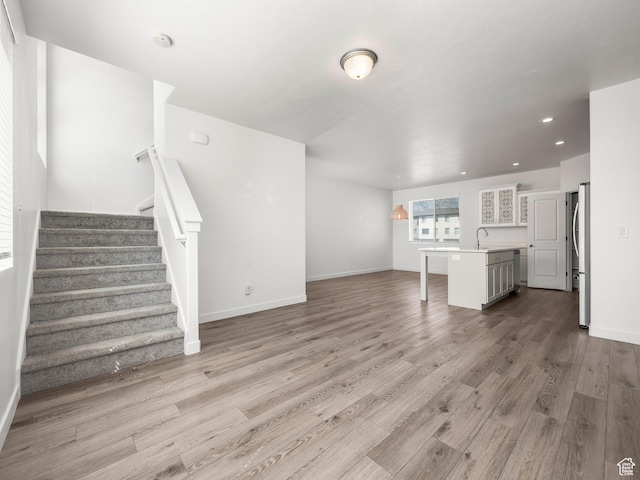 475 S 900 W, American Fork, UT 84003 - unfurnished living room featuring stairs, wood finished floors, and recessed lighting