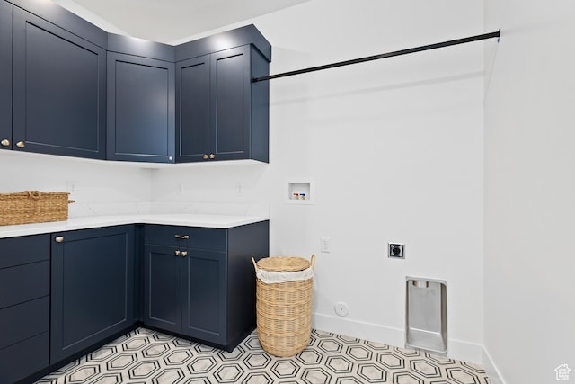 3353 W Bonita Unit 23, Hurricane, UT 84737 - washroom with cabinet space, electric dryer hookup, hookup for a washing machine, gas dryer hookup, and light tile patterned floors