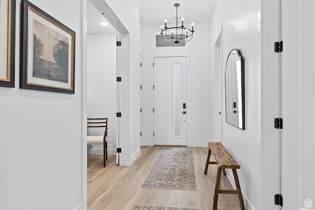 3353 W Bonita Unit 23, Hurricane, UT 84737 - foyer with a chandelier and light wood-style floors
