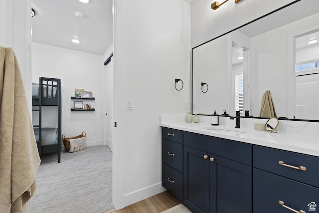 3353 W Bonita Unit 23, Hurricane, UT 84737 - bathroom with vanity and wood finished floors