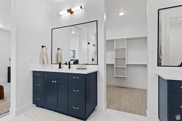 3353 W Bonita Unit 23, Hurricane, UT 84737 - bathroom with vanity, walk in shower, and a spacious closet