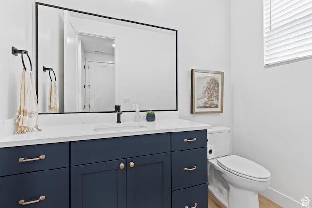 3353 W Bonita Unit 23, Hurricane, UT 84737 - half bath with vanity and wood finished floors
