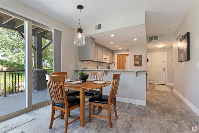 6641 N 2200 W Unit A107, Park City, UT 84098 - dining space featuring light wood-type flooring and recessed lighting