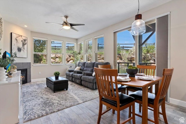 6641 N 2200 W Unit A107, Park City, UT 84098 - dining space featuring ceiling fan, wood finished floors, a fireplace, and recessed lighting