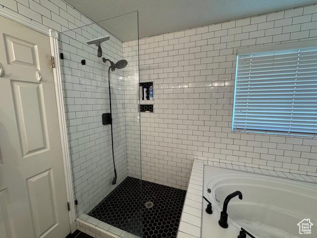 421 S 755 E, Layton, UT 84041 - bathroom featuring a shower stall and a bath