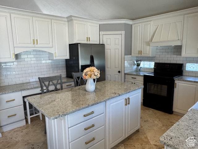 421 S 755 E, Layton, UT 84041 - kitchen featuring black range with electric stovetop, fridge with ice dispenser, custom exhaust hood, white cabinets, and a kitchen island