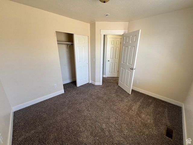 362 W 1800 S, Clearfield, UT 84015 - unfurnished bedroom with dark colored carpet and a closet