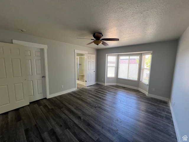 362 W 1800 S, Clearfield, UT 84015 - unfurnished bedroom with dark wood-type flooring, a textured ceiling, ceiling fan, and ensuite bathroom