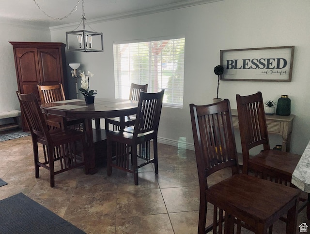 2537 S Taylor Ave E, Ogden, UT 84401 - dining room with ornamental molding and a chandelier