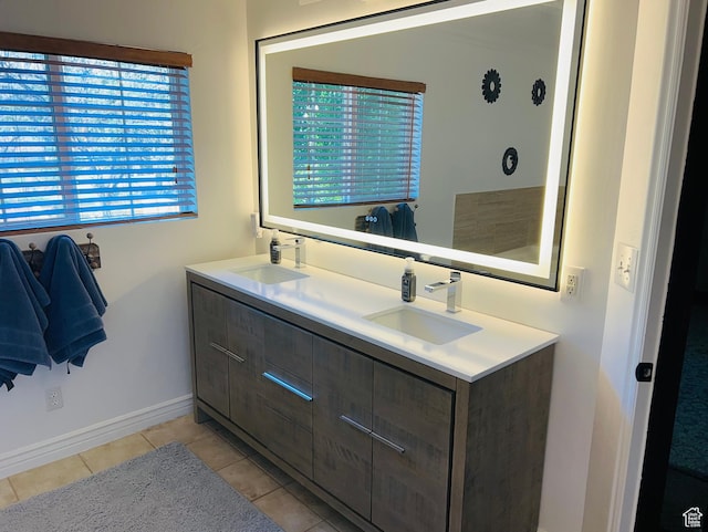 2537 S Taylor Ave E, Ogden, UT 84401 - full bath featuring double vanity and tile patterned floors