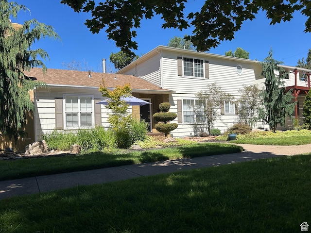 2537 S Taylor Ave E, Ogden, UT 84401 - view of front of house featuring a front lawn