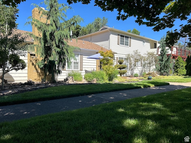 2537 S Taylor Ave E, Ogden, UT 84401 - view of front facade with a front yard