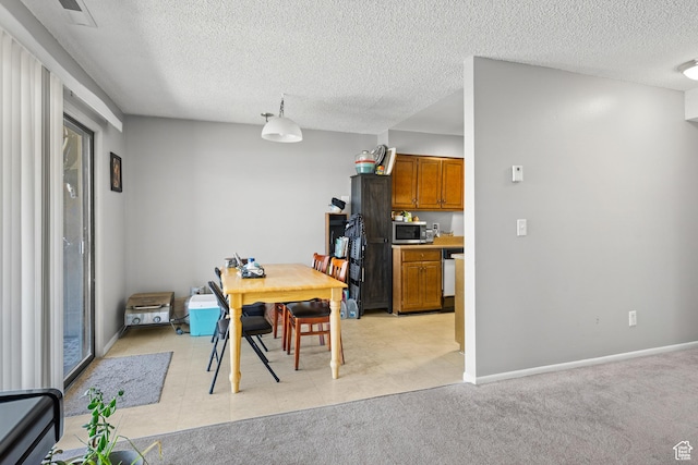 290 N 500 W Unit 210, Bountiful, UT 84010 - dining room with a textured ceiling and light carpet