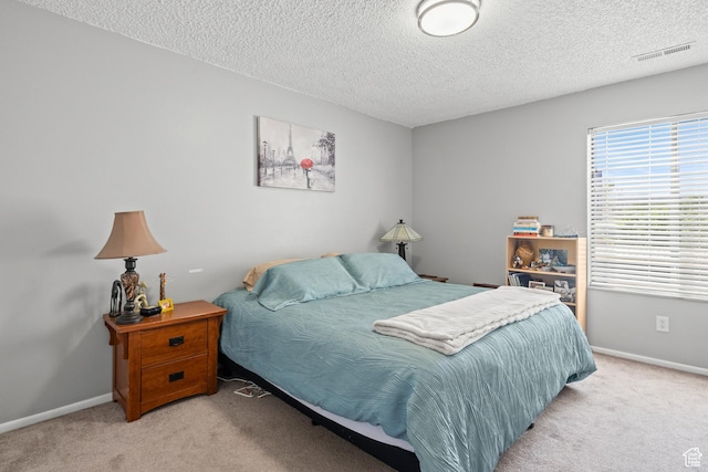 290 N 500 W Unit 210, Bountiful, UT 84010 - bedroom featuring carpet floors and a textured ceiling