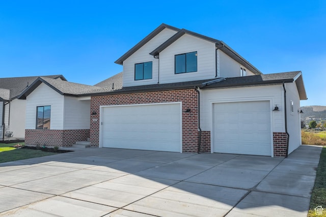 325 S 2800 E Unit 203, Spanish Fork, UT 84660 - view of front of house with brick siding and concrete driveway