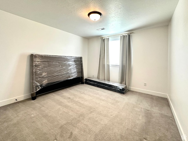 214 W Whitewater Dr, Vineyard, UT 84059 - spare room with carpet and a textured ceiling