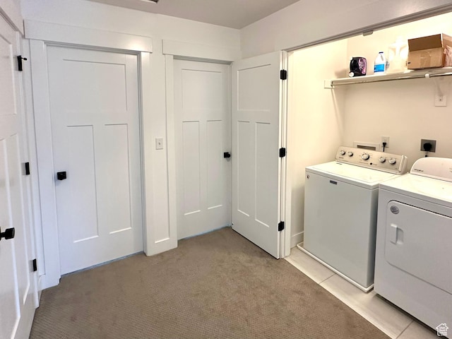214 W Whitewater Dr, Vineyard, UT 84059 - washroom featuring washing machine and clothes dryer and light carpet