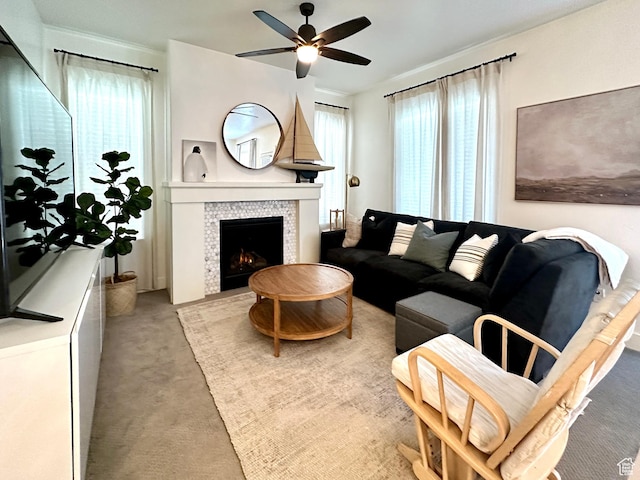214 W Whitewater Dr, Vineyard, UT 84059 - living area with ceiling fan, light carpet, and a tile fireplace